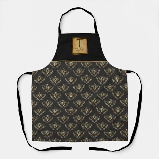 Eigen monogram, koningin, zwart en goud schort (Voorkant)