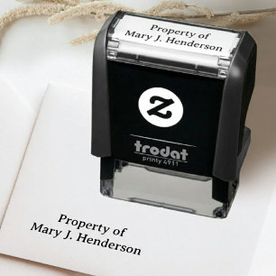 Eigendom van zelfinkende naamstempel zelfinktende stempel