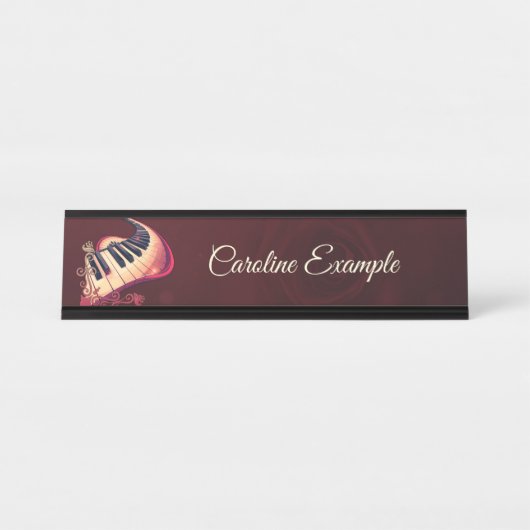 Elegance in motion, the curved piano. bureau naambordje (Voorkant)