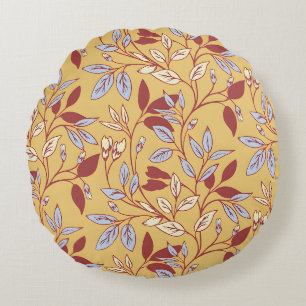 Elegant bloempatroon met rode en blauwe bladeren rond kussen