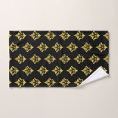 Élégant Fleur de Lis dorée sur fond noir (Serviette à main)