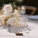 Elegant Gold Faux Foil Arch Acrylic Table Number<br><div class="desc">Please note: • The gold foil elements are simulated and printed digitally — they are not real foil. • Wood block stand is not included. Pair with matching stationery to create a cohesive and stylish celebration. • Add a touch of modern luxury to your wedding reception with this minimalist arched...</div>