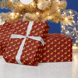 Elegant gouden kersthert op rode stip cadeaupapier