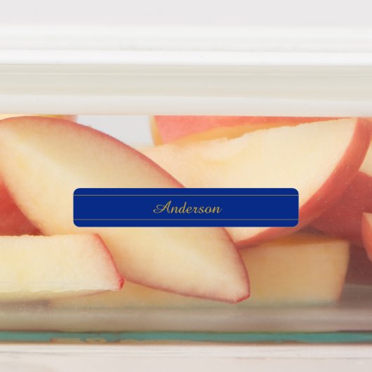 Elegant gouden script op de blauwe achtergrond van labels (Aangebracht)