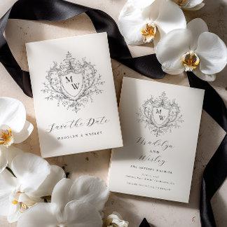 Elegant script monogram crest  save the date