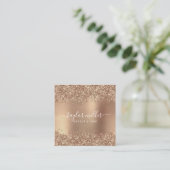 Elegant stijlvol roos goudglitter make-up en haar vierkante visitekaartje (Staand voorkant)