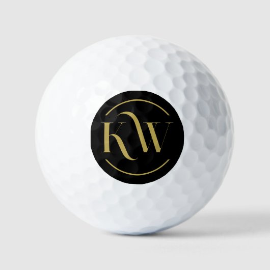 Elegant zwart en goud monogram golfballen (Voorkant)