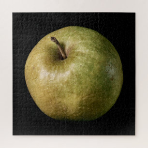 Elegante appelcollectie op zwart legpuzzel