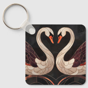 Elegante art deco zwanen vormen een hart sleutelhanger