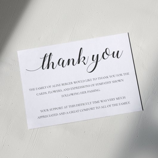 Élégante calligraphie noire Merci funéraire