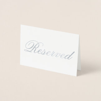 Elégante carte de table à huile d'argent réservée