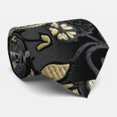 Élégante cravate florale noire et or (Roulé)