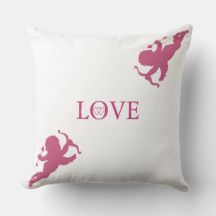 Elegante cupido's in roze goud op wit kussen