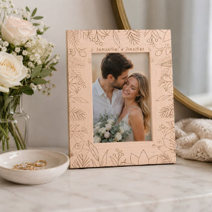 Elegante foto van koppel met aangepaste naam gegraveerde lijstjes