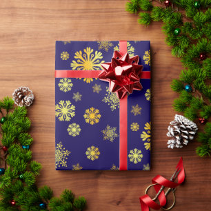 Elegante gouden sneeuwvlokken inpakpapier