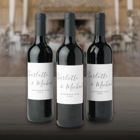 Elegante handtekening script grijze en witte trouw wijn etiket