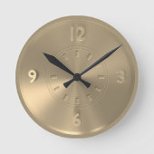 Élégante horloge métallique couleur or (Recto)