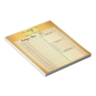 Elegante initialen op gouden dagplanner pagina's notitieblok