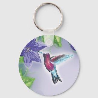 elegante kleurrijke kolibrie en paarse bloemen sleutelhanger