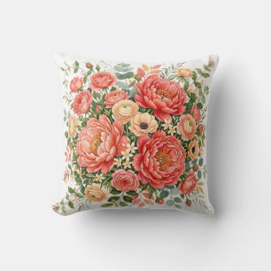 Elegante koraal- en perzikpioen bloemstuk kussen