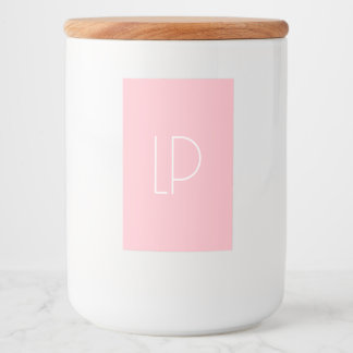 Elegante minimalistische moderne initiaal op paste voedselcontainer etiket