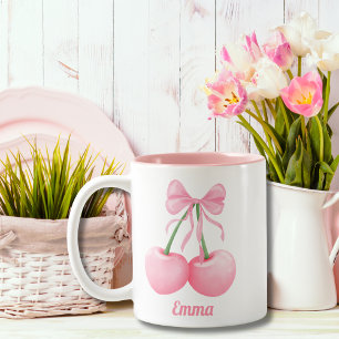 Elegante, moderne roze kersen met roze strik, op m tweekleurige koffiemok