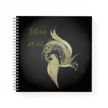 Elegante natuurkunst op zwarte notebooks