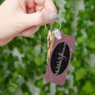 Elegante roze gouden lettering op zwarte sleutelha sleutelhanger