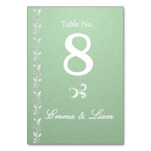 Elegante tafelschikking voor een groene pistache-h kaart