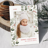 Elegante winterblad en hulstbessen foto feestdagenkaart