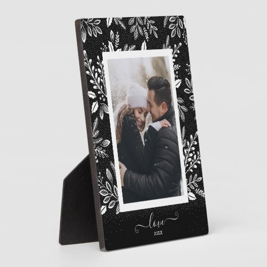 Elegante witte bloemen op zwart fotostatief met ea fotoplaat (Zijkant)