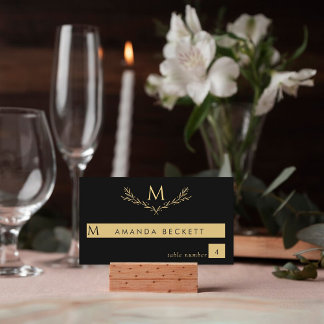 Elegante zwart en goud monogram krans bruiloft plaatskaartje