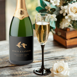 Elegante zwart en gouden vogels van een veren brui sparkling wijnetiket