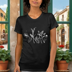Elegante zwarte T-shirt met delicate krabbelbloeme