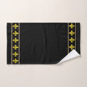 Élégantes fleurs de lis dorées sur fond noir (Serviette à main)