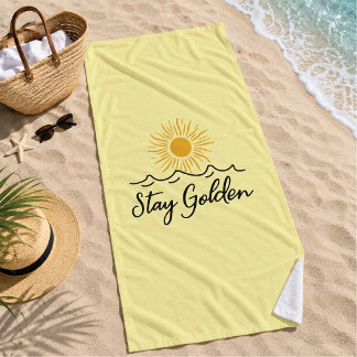 ElegaStay Gouden strandhanddoek – Zacht, stijlvol  Strandlaken