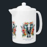 Eléphant floral coloré<br><div class="desc">Un éléphant gris avec des décorations florales colorées.</div>