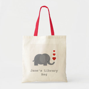 Éléphant mignon avec le sac de la bibliothèque de