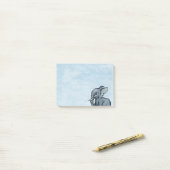 Eléphant mignon sur des notes Post-it bleues (Sur un bureau)