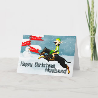 Elf met doberman in de echtgenoot van feestdagen kaart
