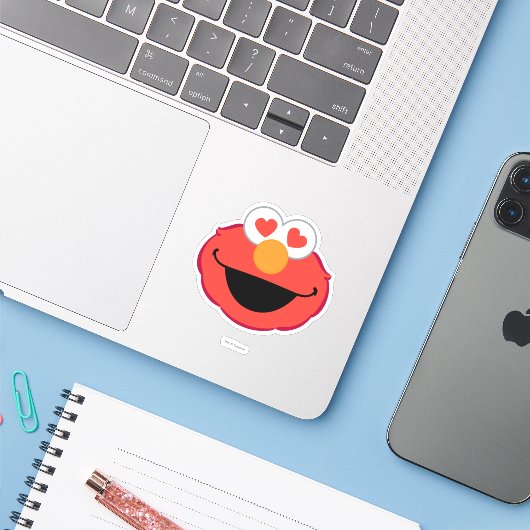 Elmo Smiling Face met Heart-Shaped Eyes Sticker (Laptop met iPhone)