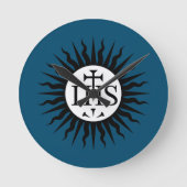 Embleem van de Maatschappij van Jezus Ronde Klok (Voorkant)