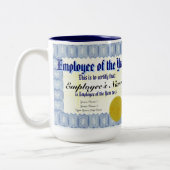 Employé de la tasse de certificat d'année (Gauche)
