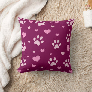 Empreinte de patte rose et blanc et Coussin de vin