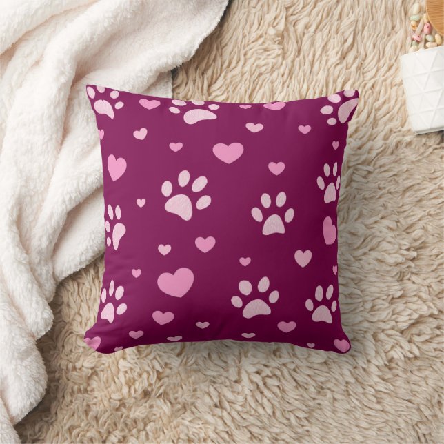 Empreinte de patte rose et blanc et Coussin de vin (Couverture)