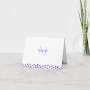 Empreintes de patte de compagnie violettes personn