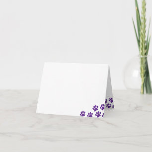Empreintes de pattes de chiot violet vierges