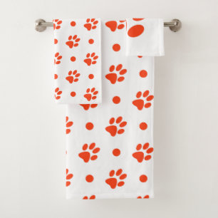 Empreintes de pattes et pois orange et blanc