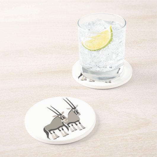 En Grès Paire mignonne de Dessous de verre d'oryxes de des (Côté)