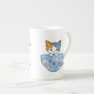 En Porcelaine Le thé de Sip et choient ma tasse de la Chine de